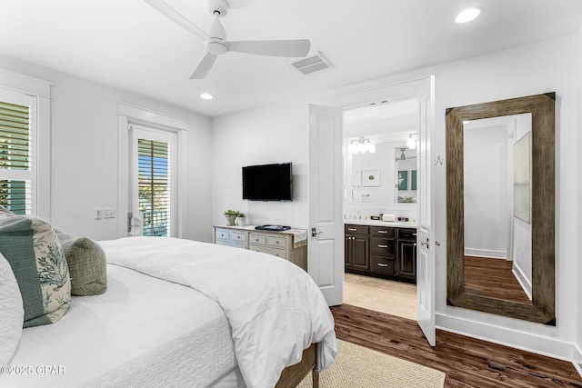 bedroom featuring recessed lighting, wood finished floors, visible vents, connected bathroom, and ceiling fan
