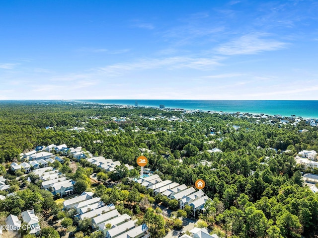 drone / aerial view with a residential view and a water view