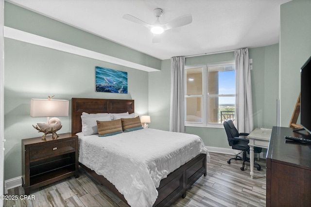 15625 Front Beach Rd Unit 1405, Panama City Beach, FL 32413 - bedroom with baseboards, a ceiling fan, and wood finished floors
