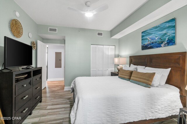 15625 Front Beach Rd Unit 1405, Panama City Beach, FL 32413 - bedroom with a closet, baseboards, visible vents, and light wood-type flooring