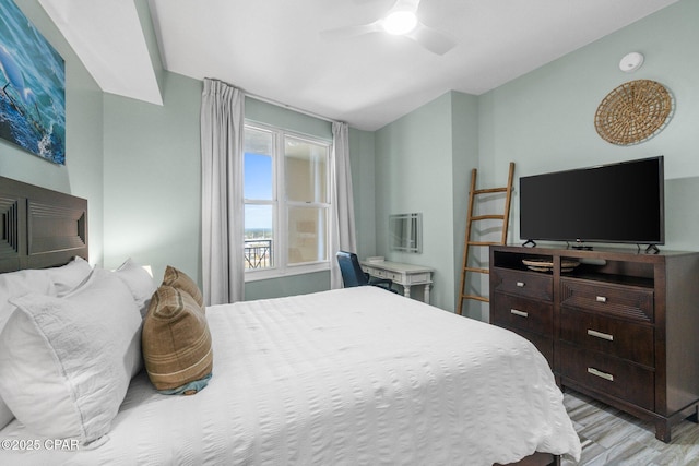 15625 Front Beach Rd Unit 1405, Panama City Beach, FL 32413 - bedroom with ceiling fan and light wood-type flooring