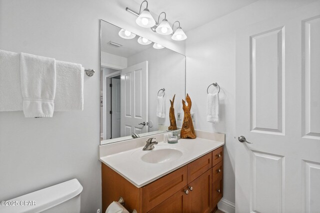 15625 Front Beach Rd Unit 1405, Panama City Beach, FL 32413 - bathroom featuring vanity, toilet, and visible vents