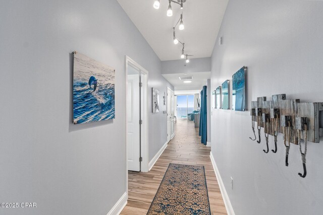 15625 Front Beach Rd Unit 1405, Panama City Beach, FL 32413 - hall with baseboards, visible vents, and light wood-type flooring