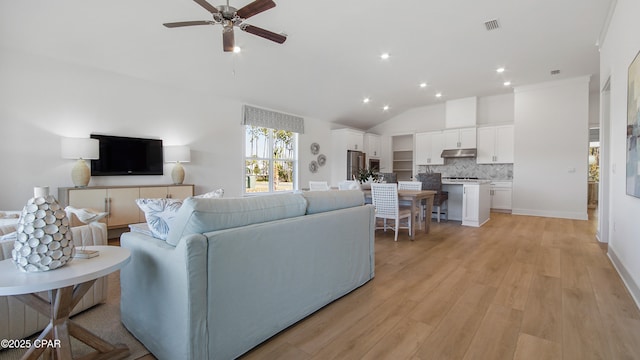 934 Crystal Bayou Blvd, Panama City Beach, FL 32407 - living area with lofted ceiling, ceiling fan, light wood-style floors, and recessed lighting
