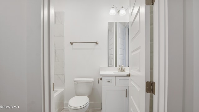 full bath with toilet, baseboards, and vanity