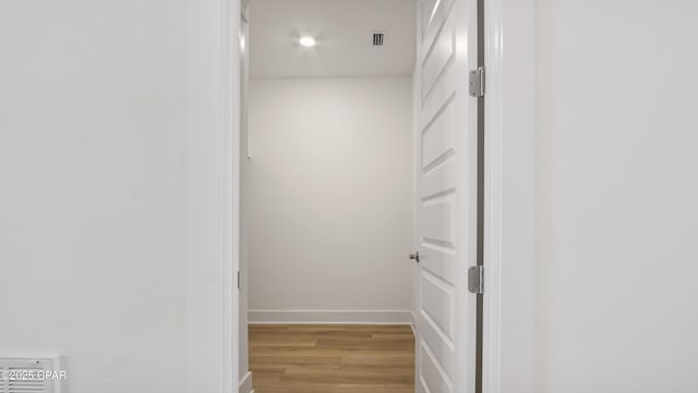 interior space with recessed lighting, baseboards, light wood-type flooring, and visible vents