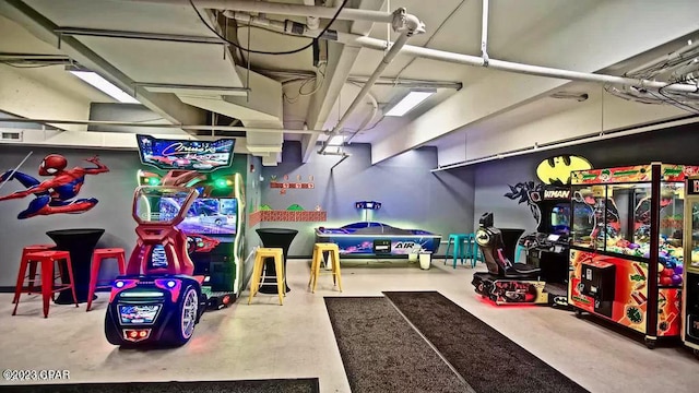 playroom with concrete flooring