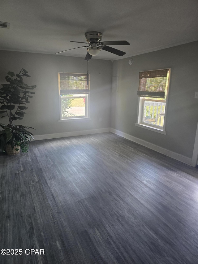 2707 W 18th St, Panama City, FL 32405 - empty room with visible vents, a ceiling fan, baseboards, and a healthy amount of sunlight