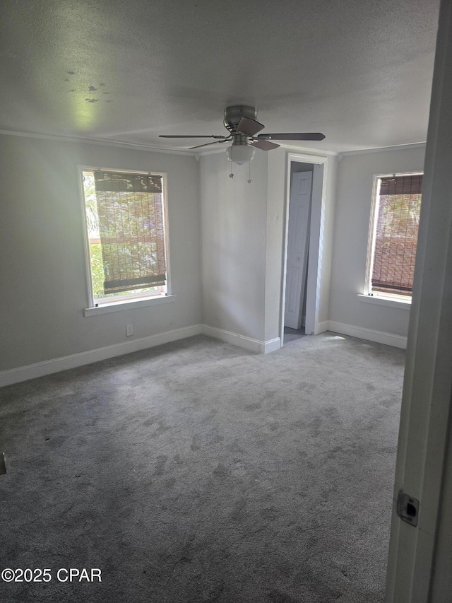2707 W 18th St, Panama City, FL 32405 - unfurnished room with baseboards, carpet, a ceiling fan, and a textured ceiling