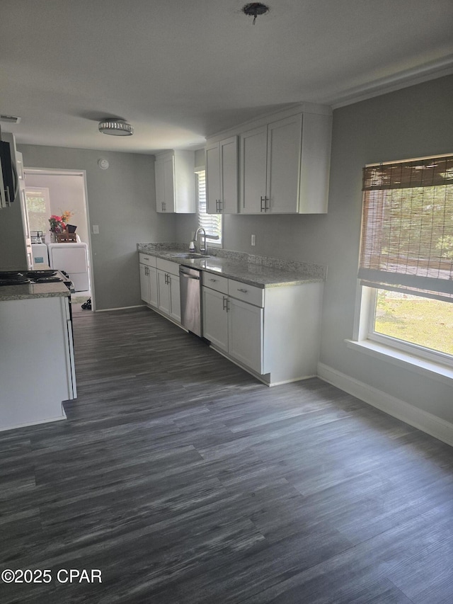 2707 W 18th St, Panama City, FL 32405 - kitchen with baseboards, dark wood finished floors, light stone counters, and dishwasher