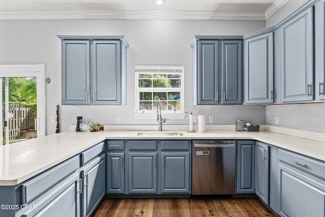 2501 Pelican Bay Dr, Panama City, FL 32408 - kitchen featuring stainless steel dishwasher, a sink, a peninsula, ornamental molding, and healthy amount of natural light