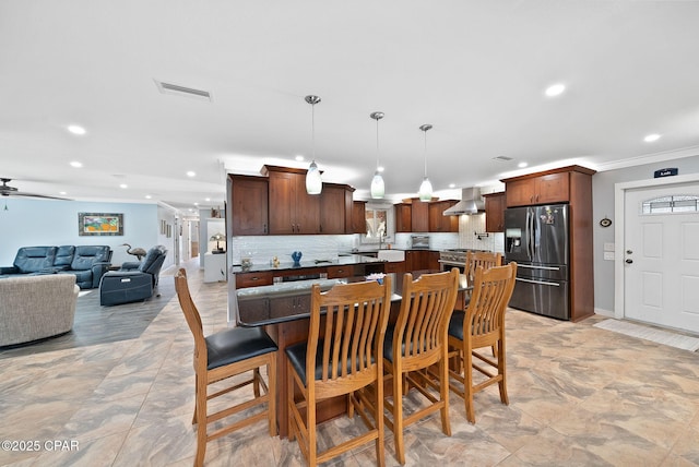 dining space with crown molding, recessed lighting, and visible vents
