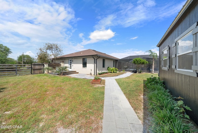 view of yard featuring fence