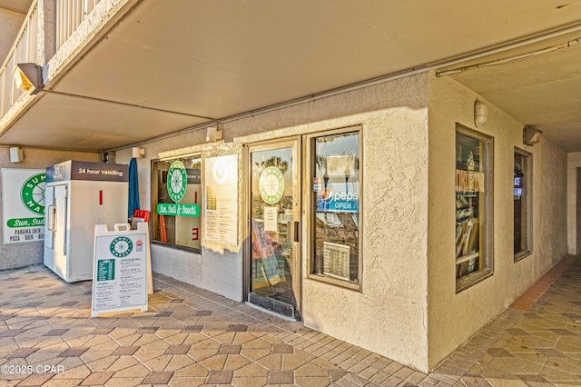 exterior space featuring stucco siding