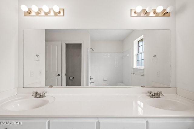 bathroom with shower / tub combination and vanity