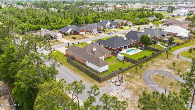birds eye view of property with a residential view