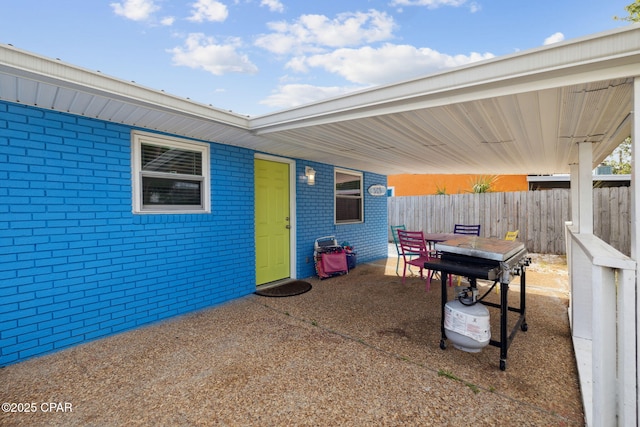 view of patio / terrace with fence