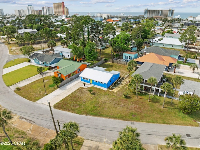 birds eye view of property with a view of city