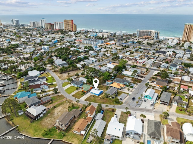 aerial view featuring a view of city and a water view