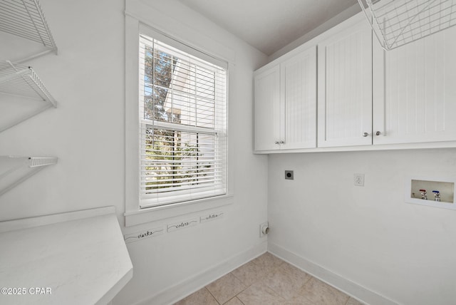 laundry room featuring baseboards, washer hookup, cabinet space, and electric dryer hookup