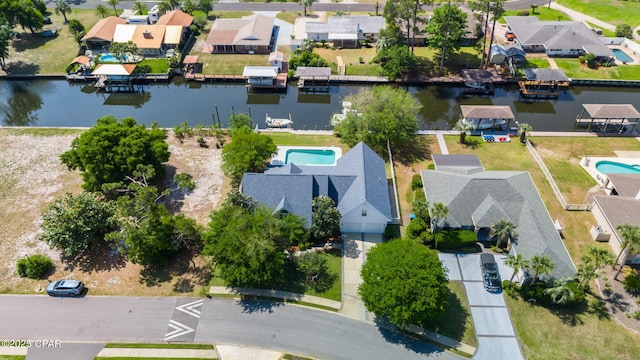 aerial view with a water view and a residential view
