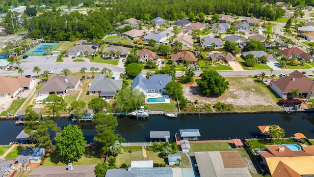aerial view with a water view and a residential view