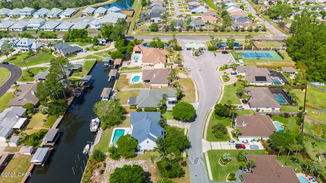 aerial view featuring a water view and a residential view