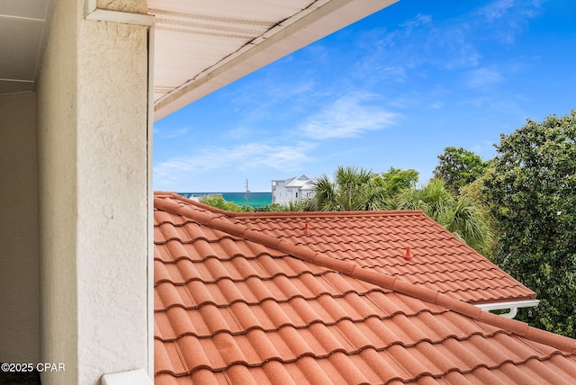 exterior details featuring a tile roof