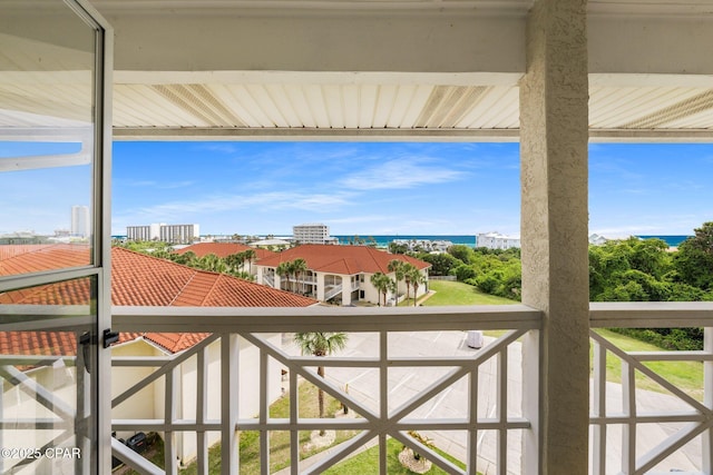 balcony featuring a water view