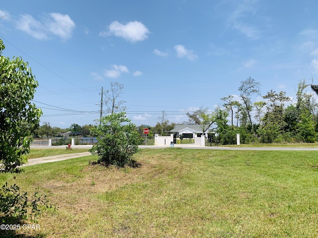 1003 E 8th St, Lynn Haven, FL 32444 - view of front of property with a front yard