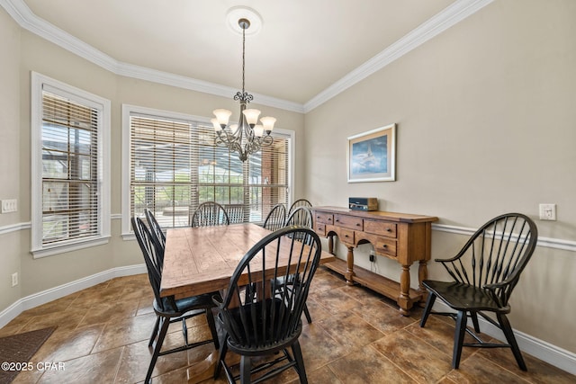 dining room featuring crown molding, baseboards, an inviting chandelier, and a healthy amount of sunlight