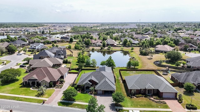 aerial view with a water view and a residential view