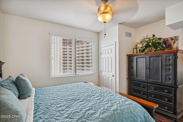 9900 S Thomas Dr Unit 1418, Panama City Beach, FL 32408 - bedroom with visible vents and ceiling fan