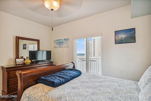 9900 S Thomas Dr Unit 1418, Panama City Beach, FL 32408 - bedroom with a ceiling fan and access to outside