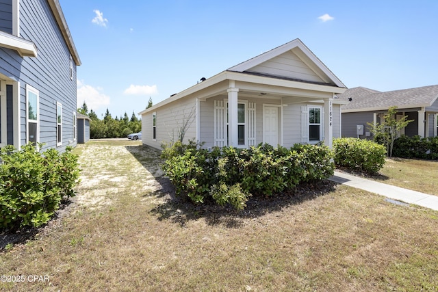 view of front of home with a front yard