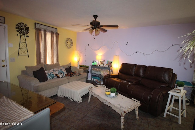 living room with a ceiling fan and tile patterned floors