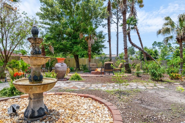 view of yard with a patio and a fenced backyard