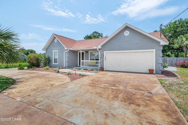 ranch-style home featuring stucco siding, covered porch, fence, a garage, and concrete driveway