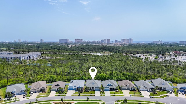 birds eye view of property featuring a view of city