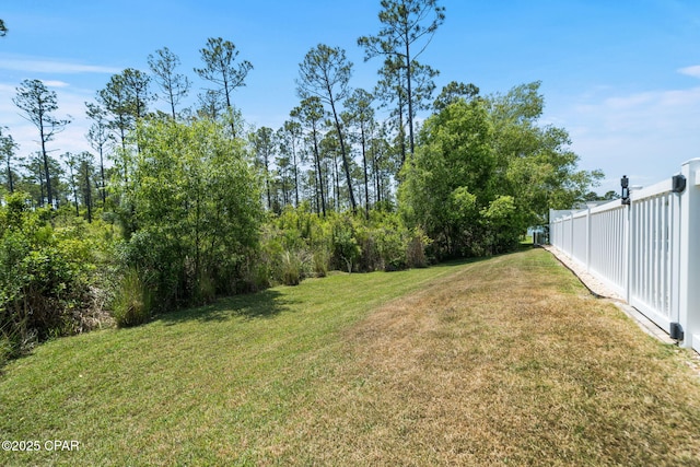 view of yard featuring fence