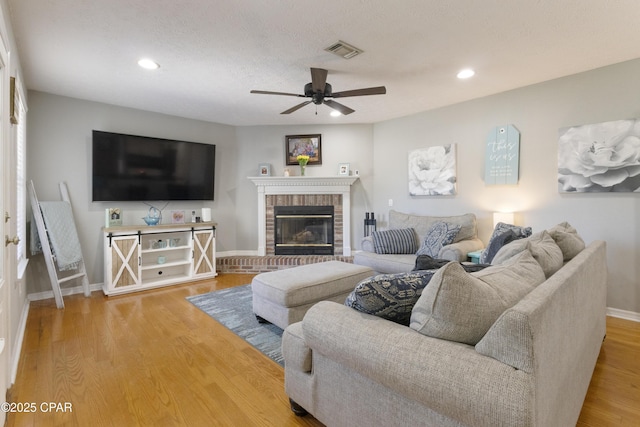 924 N College Blvd, Lynn Haven, FL 32444 - living area with recessed lighting, a fireplace, ceiling fan, visible vents, and baseboards