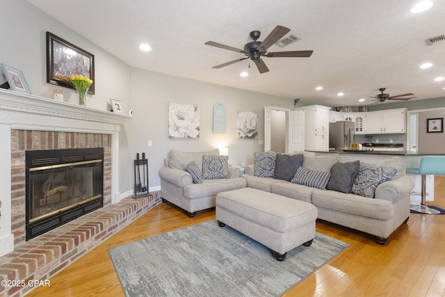 924 N College Blvd, Lynn Haven, FL 32444 - living room featuring visible vents, a ceiling fan, light wood-style flooring, and recessed lighting
