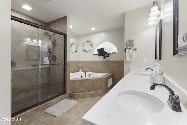 924 N College Blvd, Lynn Haven, FL 32444 - bathroom featuring double vanity, a shower stall, a bath, and a sink