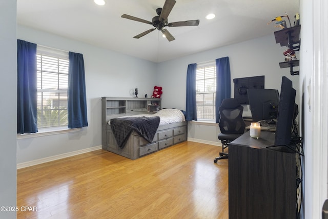 924 N College Blvd, Lynn Haven, FL 32444 - bedroom featuring light wood-type flooring, recessed lighting, a ceiling fan, and baseboards