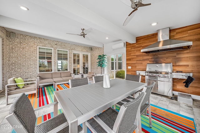 interior space with an outdoor hangout area, outdoor dining area, a wall mounted AC, a ceiling fan, and a grill
