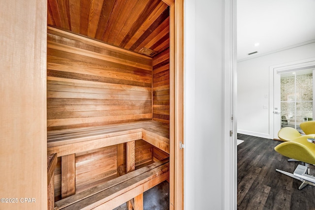 view of sauna / steam room featuring wood finished floors and baseboards