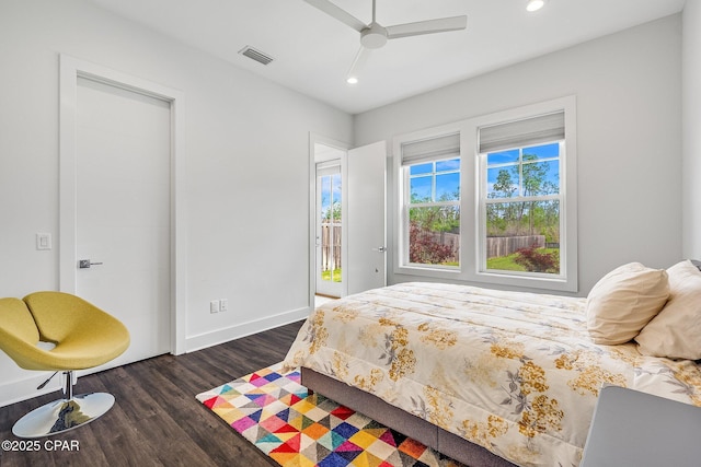 bedroom featuring dark wood-type flooring, visible vents, recessed lighting, and baseboards