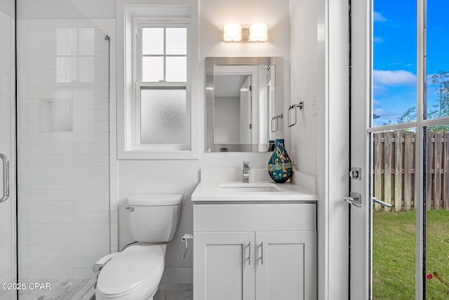 full bath featuring a shower stall, toilet, and vanity