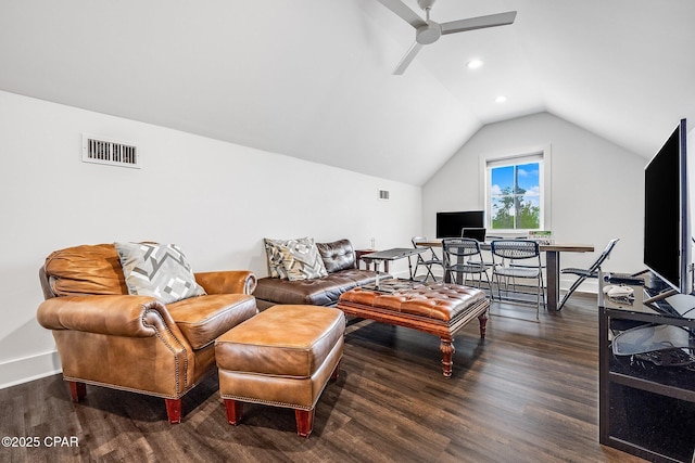 living room featuring visible vents, wood finished floors, a ceiling fan, and vaulted ceiling