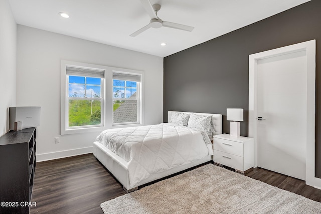 bedroom featuring dark wood-style floors, recessed lighting, ceiling fan, and baseboards